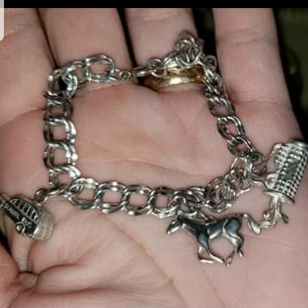 Vintage sterling silver charm bracelet with charms